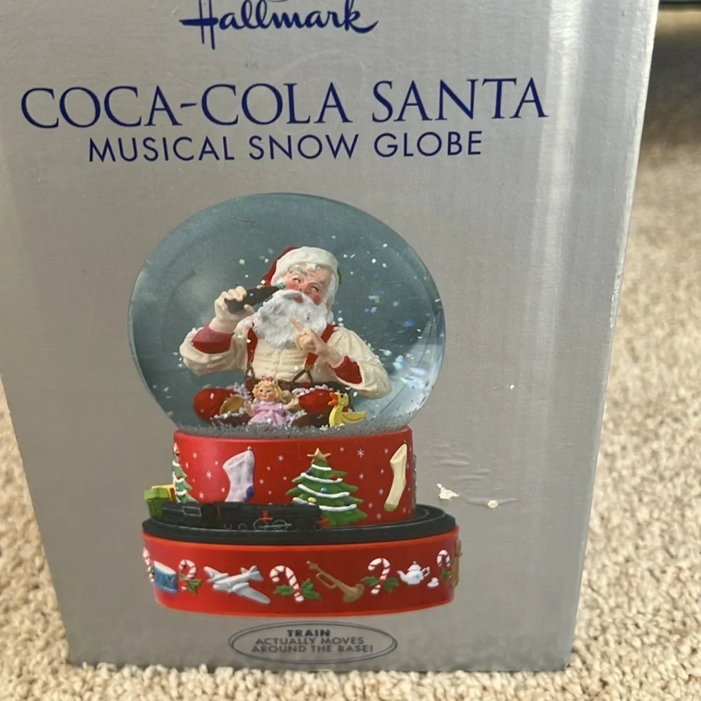 Hallmark Coca cola santa musical snow globe.
